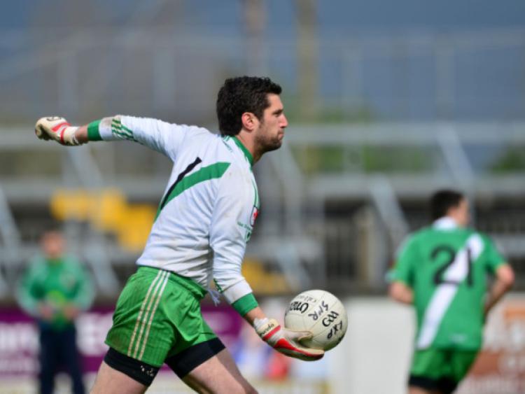 11-05-2014 Sarsfields goalkeeper Patrick O'Sullivan clears the ball against Leixlip in the Joe Mallon Renault SFC game at St Conleth's Park.