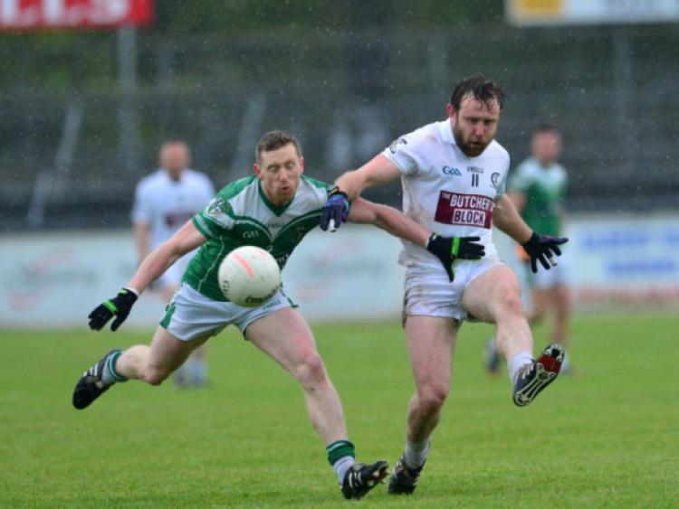 Clane's Robbie Dunne gets away from Liam Callaghan of Moorefield in the Joe Mallon Renault senior football championship game at St Conleth's Park, Newbridge.