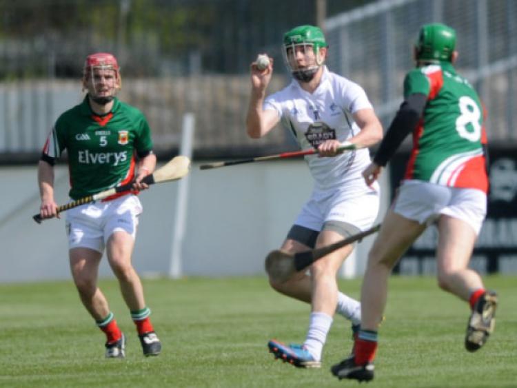 Kildare's Paul Divilly scores a point from Shane Morley and Padraig O Flynn of Mayo in the Christy Ring Cup game at St Conleth's Park, Newbridge. Picture: Adrian Melia