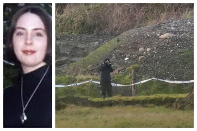 A Garda forensics photographer recording images of the search site on the Kildare / Wicklow border (Photo: Niall Carson / PA Wire)