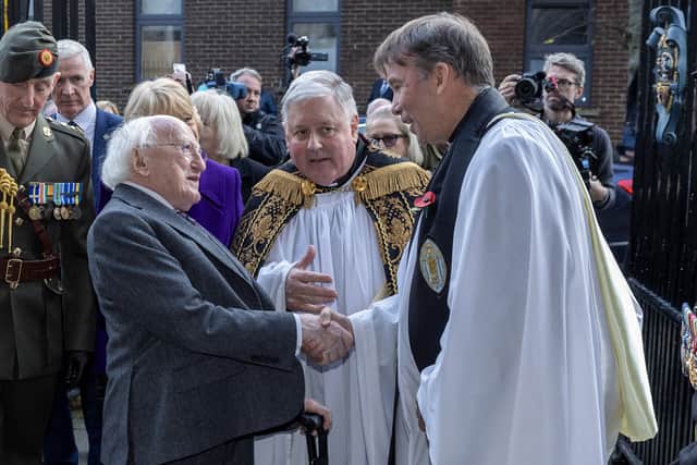 In Dublin, outgoing Irish President Michael D Higgins marked his penultimate day in office by laying a wreath at a remembrance service at St Patrick’s Cathedral.