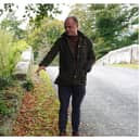 Bereaved father Michael English at Kilmoyler Bridge where his daughter Bronagh (INSET) died in a road traffic accident last April. Picture: Maria Taylor