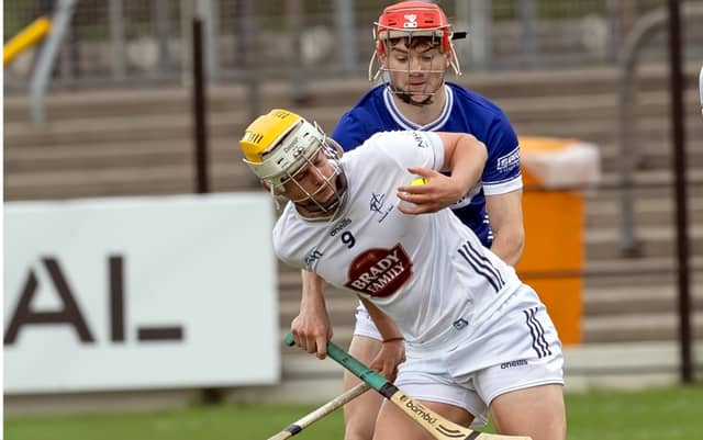 Kildare Evan O'Briain wins possession ahead of Laois Jack Breen during the Leinster Gaa U20 Hurling Championship game played at Cedral St Conleths Park, Photo by Sean Brilly