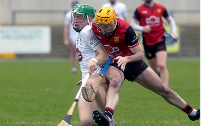 Kildare Jack Sheridan feels the brunt of the challenge from Down Matt Conlon during the Allianz National Hurling League Division 2 Final, Photo by Sean Brilly