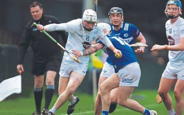 Kildare Charlie Sheridan takes on the Laois defence in the oneills.com Leinster U20 Hurling Championship opening round. Photo: Sean Brilly