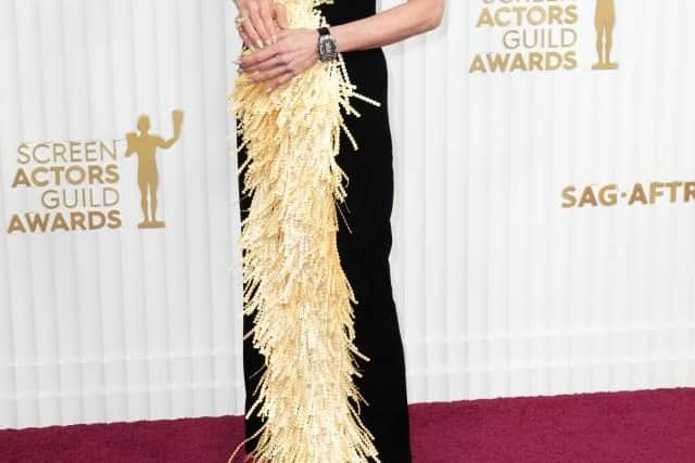 Danielle Deadwyler, nominated for her role in Till, donned a custom Louis Vuitton look, with her white and pink scallop-edged gown encrusted with sequins and beads.
