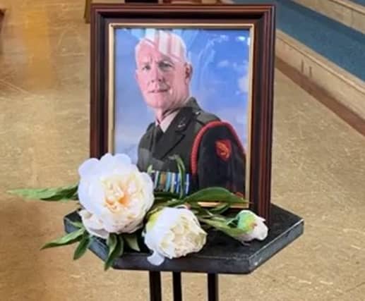 A portrait of the late Declan 'Doc' O' Connell at his funeral earlier today.