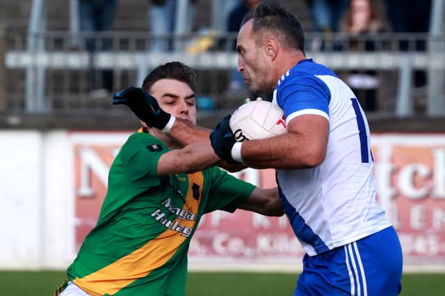 Straffan Rob Kelly pushes past Luke Purcell Kill in the Tom Cross JFC final