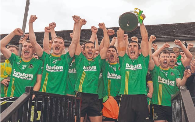 Ballyteague captain Gerry Melia lifts the Hugh Campion Cup followong his side's brilliant win over Castledermot in the IFC final