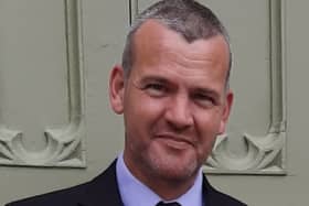 When last seen, Bryan was wearing a grey jacket, blue jeans and black boots