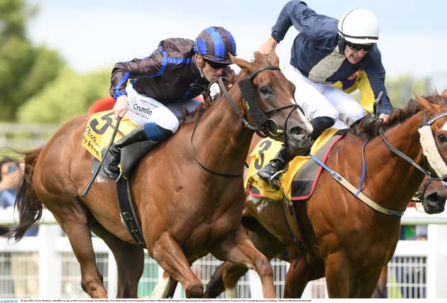 Teresa Mendoza, with Billy Lee up, on their way to winning The Dubai Duty Free Dash Stakes from second place Prisoner's Dilemma with Donagh O'Connor at The Curragh Racecourse, Photo by Matt Browne