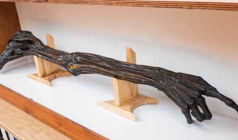 His dominant arm was notably later stolen and eventually retrieved by his fans from a surgeon, who asked them to keep the arm and encase it in red lead paint.