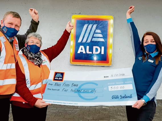 Aldi charity champion Angela Stojanovic presenting a €500 donation to John and Catherine Merrick of Naas Food Bank. Pic: A Conway