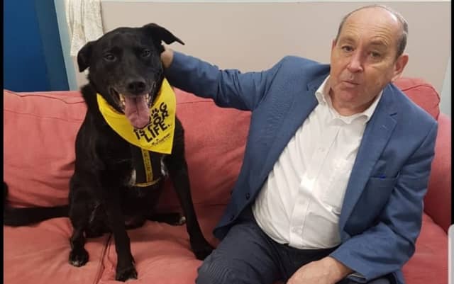 Oscar pictured with his adopter, Brian Lahiff