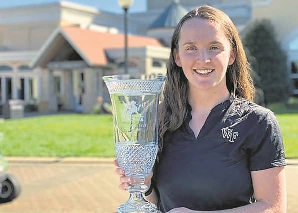 Lauren Walsh, with her winning trophy