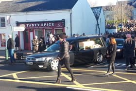 The remains of Fr John Cummins are taken from the Church of the Most Holy Rosary Abbeyleix to  his home town of Newbridge in Co Kildre.
