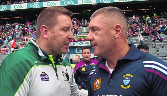 Kildare manager Cian O'Neil and Tom Cribbin
