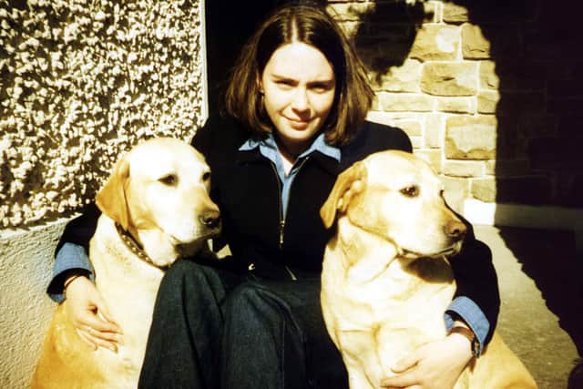 Newbridge woman Deirdre Jacob, pictured with her two labrador dogs before her disappearance