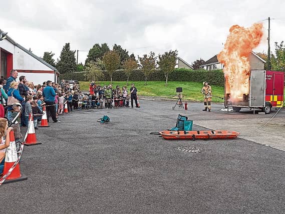 Naas Fire Station crew demonstrate the dangers of how a chip pan .........................fire can get out of control, pictured at Naas Fire Station Open Day 2017 last September.