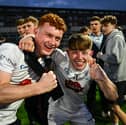 Aidan Tobin of Kildare, right, celebrates with a supporter after the Electric Ireland Leinster GAA Football Minor Championship final match between Meath and Kildare at Laois Hire O'Moore Park in Portlaoise, Laois. Photo by Tyler Miller/Sportsfile