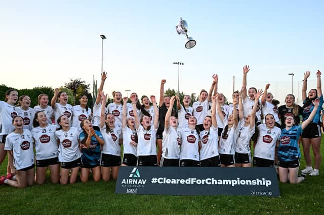 Kildare players celebrate with the trophy after their side's victory in the 2026 AirNav Ireland All-Ireland U-16 A Championship final match between Cavan and Kildare at Páirc Chiarain in Westmeath. Photo by Seb Daly/Sportsfile