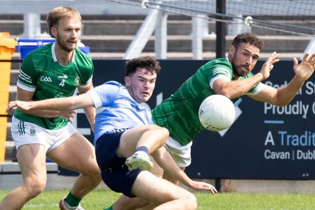 Allenwood forward Joey Cunningham being closed down by Moorefield defenders Liam Healy and Kevin Murnaghan, Photo by Sean Brilly