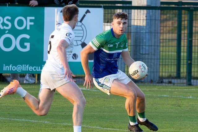 Johnstownbridge wing-back Shane Flynn, who hit 0-4 on the night, looks to turn inside Calum Doran of Clane