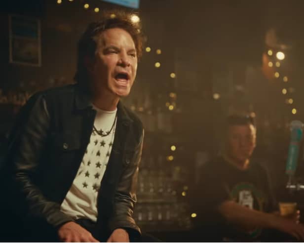 Train lead singer Pat Monahan in the Mad Dog in the Fog with Cyril Hackett in the background