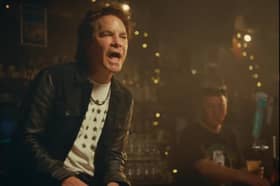Train lead singer Pat Monahan in the Mad Dog in the Fog with Cyril Hackett in the background