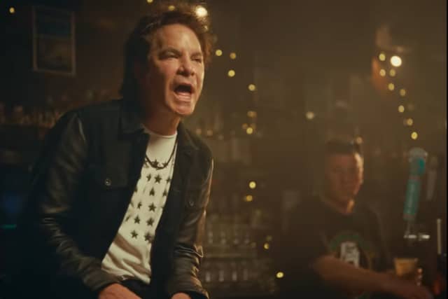 Train lead singer Pat Monahan in the Mad Dog in the Fog with Cyril Hackett in the background