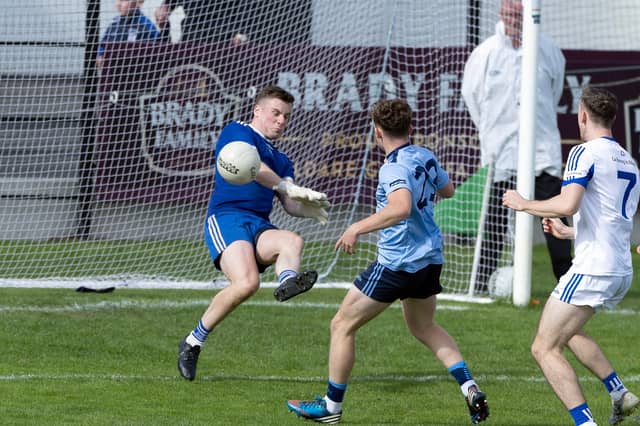 Naas keeper Luke Mullns makes a fine save to deny Tom Boran