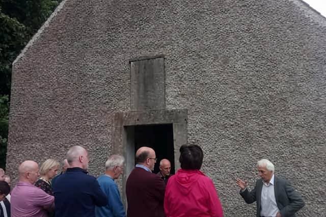 Local historian Seamus Cullen leading a tour of the Wogan Browne Mausoleum
