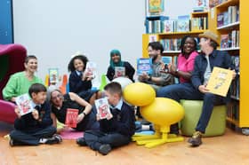 Photographed at the launch of The Best Irish Books of 2026 are Ladan, 7, Casey, 11, Yannaty, 8, and Koby, 8, pupils from Scoil Treasa Naofa in Dublin 8, along with Senior Librarian at Kevin Street Library, Neasa McHale. Also photographed are featured artists from Best Irish Books of 2026: Zainab Boladale, author of 'Looking for Aurora' (The O'Brien Press);  Peter Donnelly, author and illustrator of 'I am not a Dog'(Gill Books);  Johnathan Sung, author and illustrator of 'Moon Moon Can't Sleep' (Bad Book Press);  Jen Wallace, author of 'Project Dinosaur' (Little Island Books); and  Máire Zepf, author of 'Dearg' (Futa Futa)