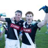 Maynooth's Ciarán Flanagan and  Niall O'Sullivan celebrate after the final whistle