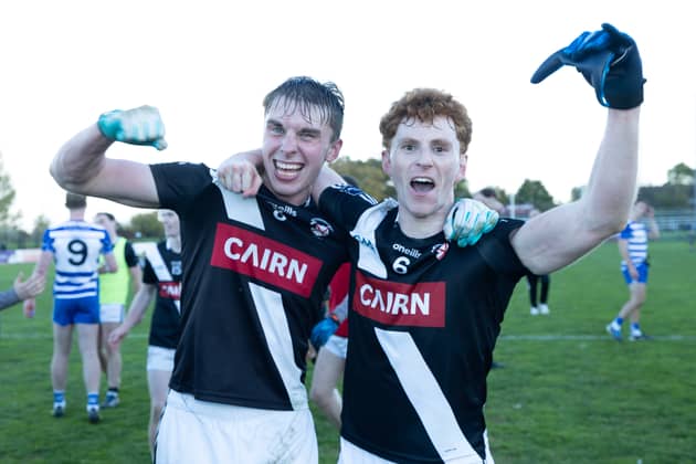 Maynooth's Ciarán Flanagan and  Niall O'Sullivan celebrate after the final whistle