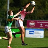 Caragh midfielder Dan Lynam fields the ball against Kilcock