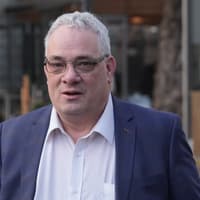 Sinn Féin TD is chairman of charity investigated by gardaí, party says