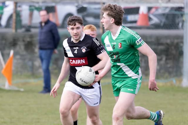 Cathal White of Sarsfields turns outfield away from Darren Maguire of Maynooth in Kildare SFL Division 1 action