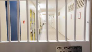 Prisoner gets longer spell behind bars for threatening to cut the throat of a prison officer and his children