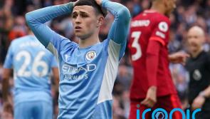 Manchester City retain slender Premier League lead after thrilling draw with Liverpool