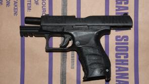 Garda&iacute; arrest two men after discovery of loaded semi-automatic weapon