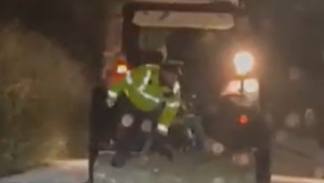 WATCH: Twitter users praise Garda for sanding dangerous roads on back of trailer