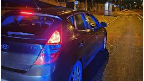 Kildare gardai catch driver with pint in cup holder after near miss on busy Irish road