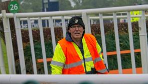 Naas candidate rushing from track to count centre between races