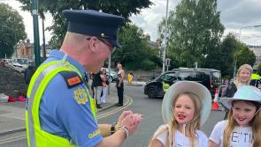 Cute moment young Taylor Swift fans gift garda a friendship bracelet at Dublin gig