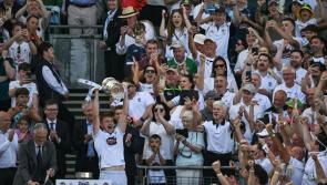 Hill 16 drenched in white and Kevin Feely in the Hogan Stand cap Kildare's day in Croker