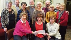 Newbridge carol singers donate €9,000 to two charities