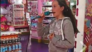 WATCH: Kildare schoolgirl goes viral for singing performance at London toy shop