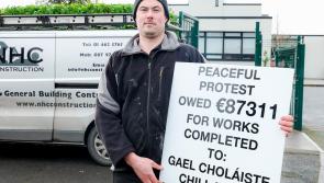 Builder protests outside Gael-Choláiste Chill Dara in Naas, County Kildare