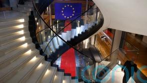 Four people charged with corruption as scandal continues to rock European Parliament
